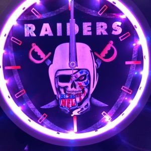 Raiders skull head wall clock with led lights